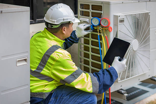 Professional Air Duct Cleaning technician working in Heath, TX